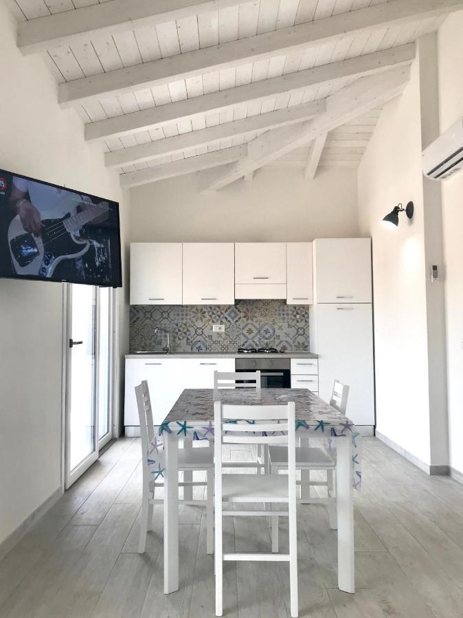 Case Vacanze "Bianco Mare" Porto Pino Exterior photo