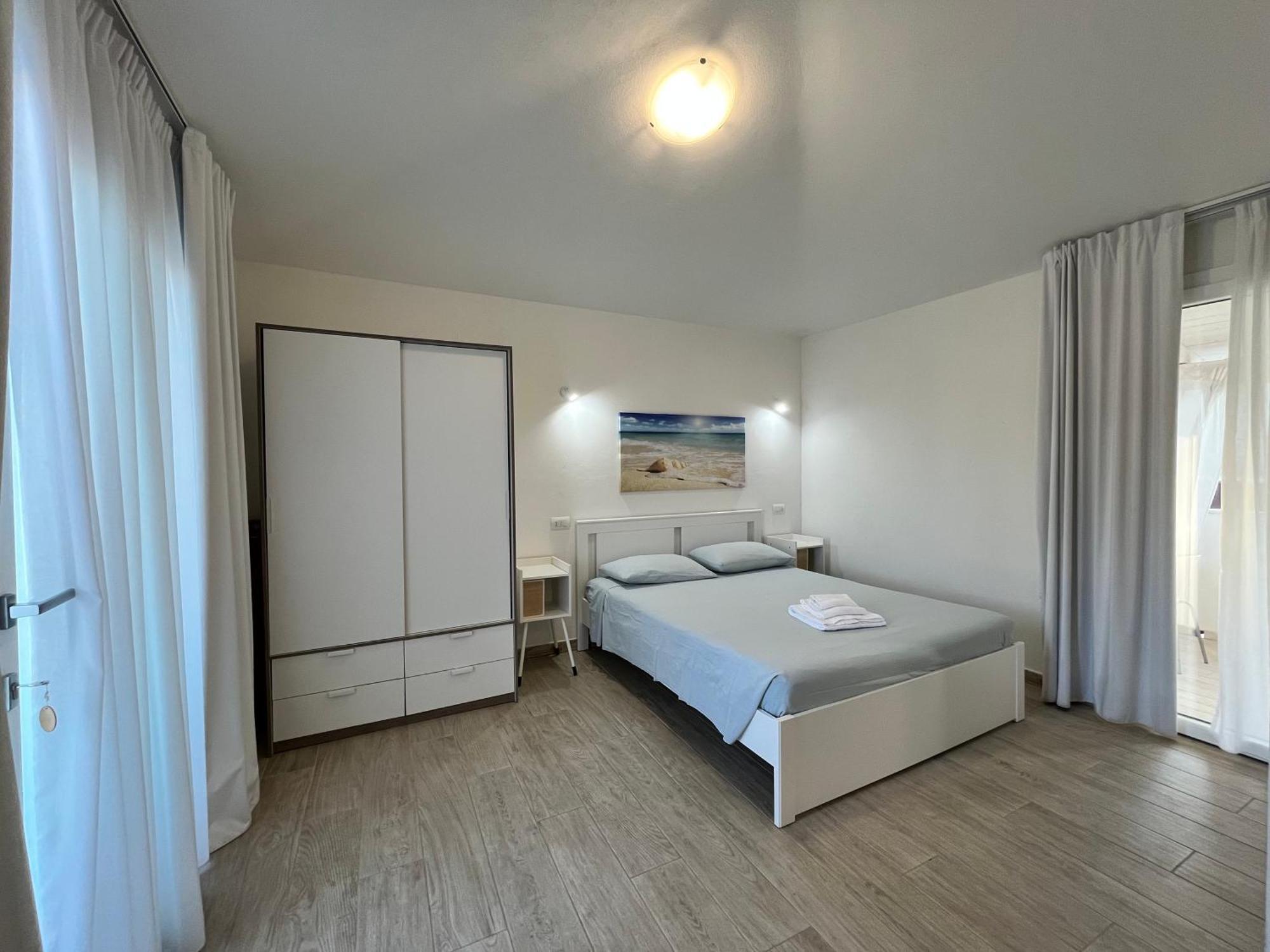 Case Vacanze "Bianco Mare" Porto Pino Exterior photo