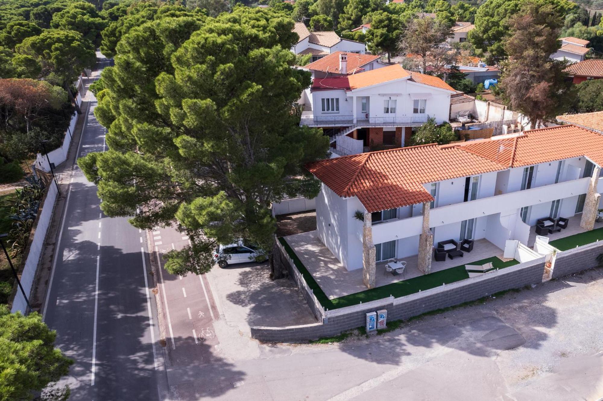 Case Vacanze "Bianco Mare" Porto Pino Exterior photo