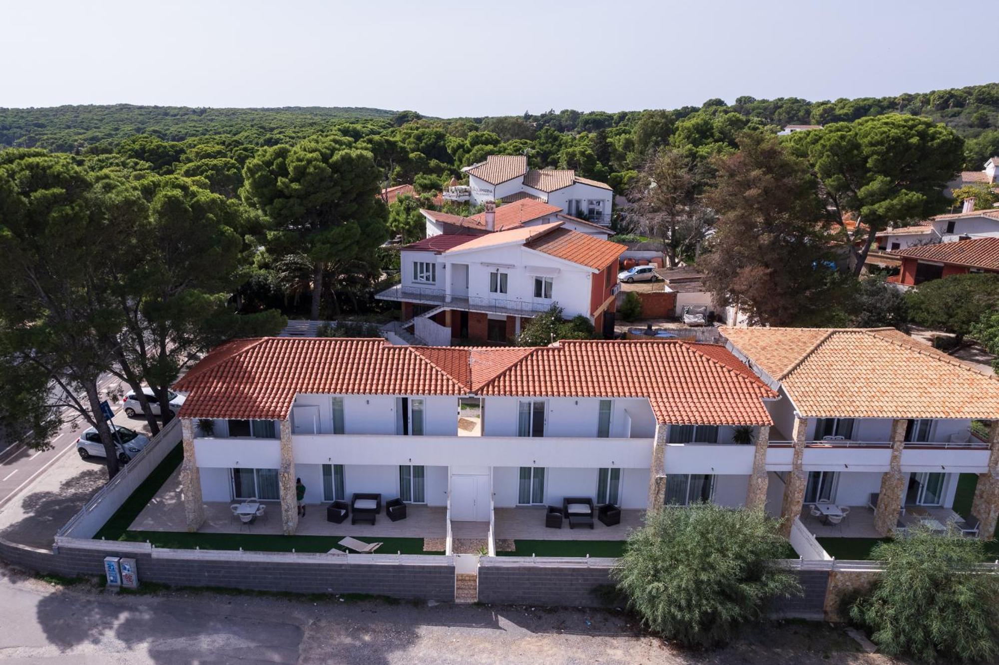 Case Vacanze "Bianco Mare" Porto Pino Exterior photo