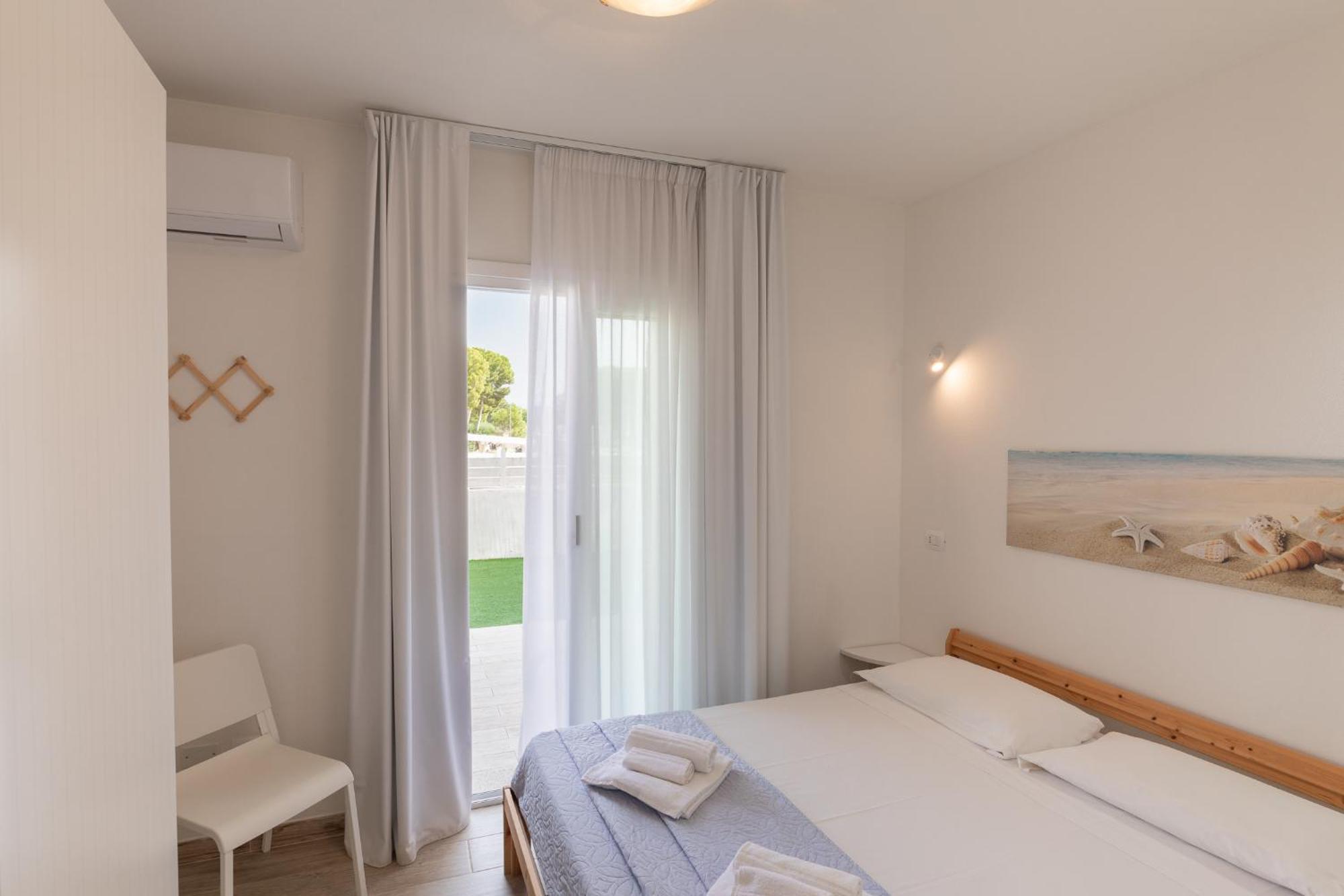 Case Vacanze "Bianco Mare" Porto Pino Room photo