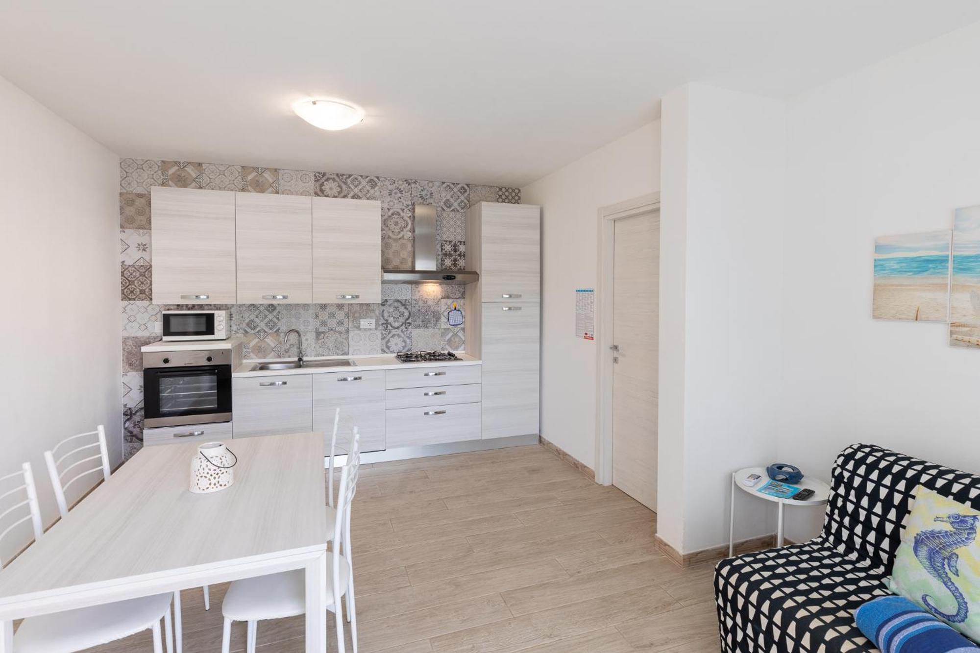 Case Vacanze "Bianco Mare" Porto Pino Exterior photo