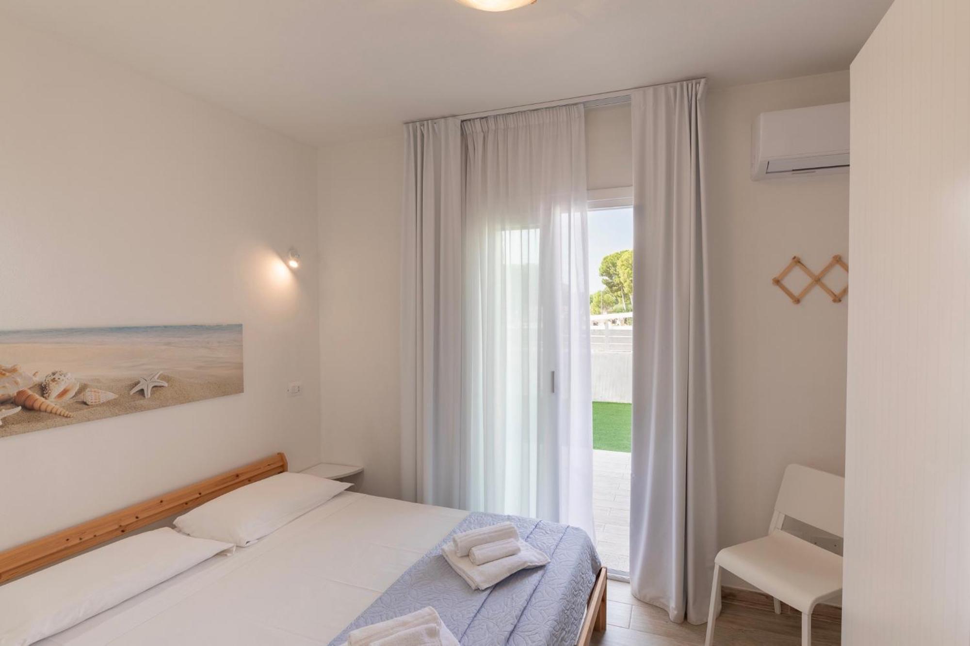 Case Vacanze "Bianco Mare" Porto Pino Room photo